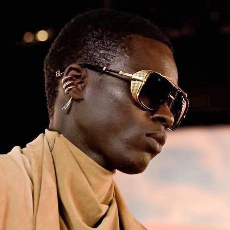 B-boy freezing mid-airflare wearing Casablanca aviators with graffiti-reflective lenses