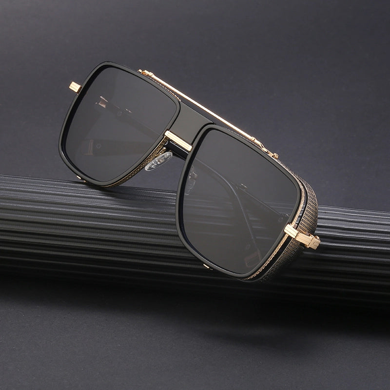 B-boy freezing mid-airflare wearing Casablanca aviators with graffiti-reflective lenses